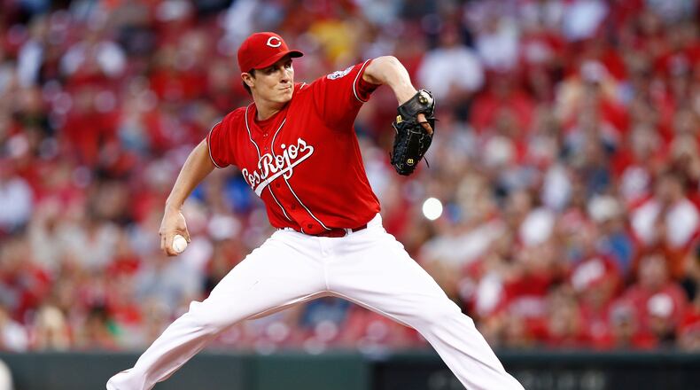 CINCINNATI, OH - SEPTEMBER 27: Homer Bailey #34 of the Cincinnati Reds pitches in the first inning against the Pittsburgh Pirates during the game at Great American Ball Park on September 27, 2013 in Cincinnati, Ohio. (Photo by Joe Robbins/Getty Images)
