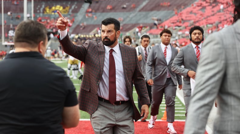 Ohio State coach Ryan Day waves to fans after arriving at Ohio Stadium on Saturday, Sept. 3, 2022, in Columbus. David Jablonski/Staff
