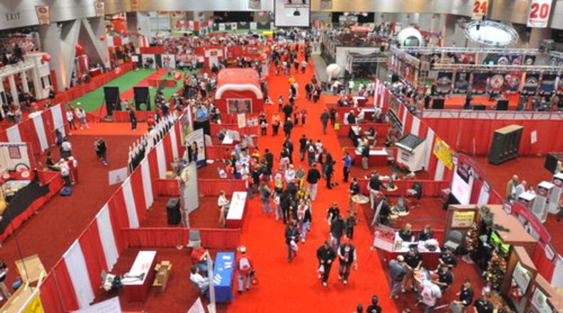 FILE: Fans fill the aisles at Redsfest XI at Duke Energy Convention Center in Cincinnati, an opportunity for fans to meet former and current players, buy and sell memorabilia, and learn about the history of Major League Baseball.