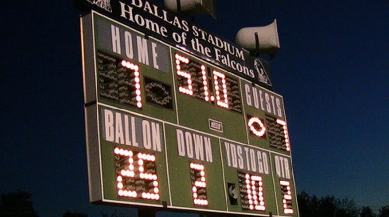 The scoreboard at Dallas Stadium in St. Paris. DAVID JABLONSKI/STAFF PHOTO