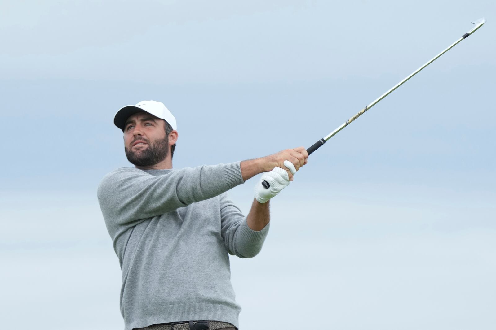 Scottie Scheffler of the United States plays off the 6th tee during the first round of the British Open golf championship at the Royal Portrush Golf Club, Northern Ireland, Thursday, July 17, 2025. (AP Photo/Jon Super)