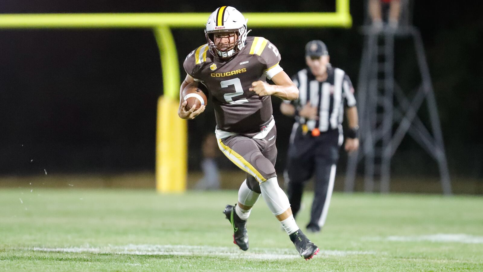 Kenton Ridge High School junior Julian Daniels carries the ball during their game against Northwestern earlier this season. CONTRIBUTED PHOTO BY MICHAEL COOPER