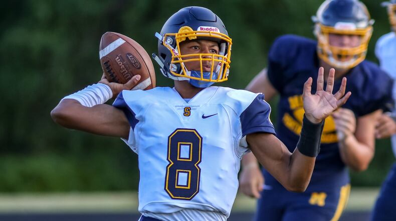 Springfield High School sophomore quarterback Te’Sean Smoot prepares to throw the ball during the Wildcats’ game against Moeller on Friday night at Springfield. CONTRIBUTED PHOTO BY MICHAEL COOPER