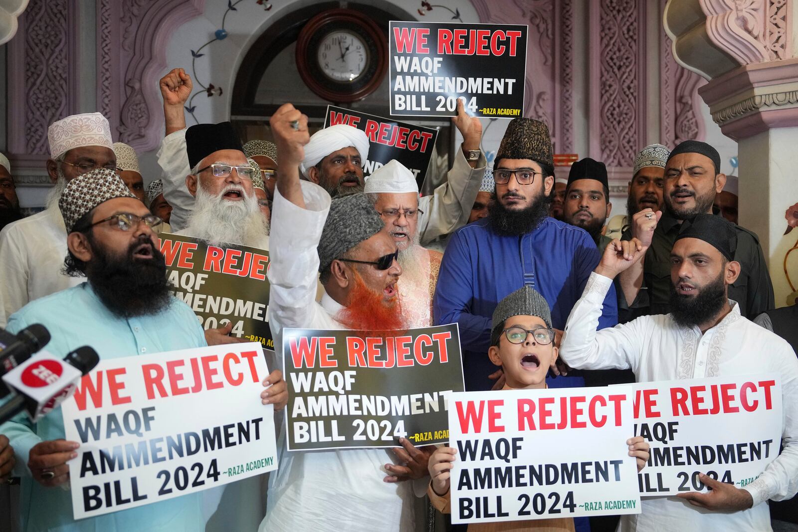 Raza Academy members shout slogans in Mumbai, India, to condemn the Waqf amendment bill that was passed early Thursday by the Lower House of India's parliament, Thursday, April 3, 2025. (AP Photo/Rajanish Kakade)