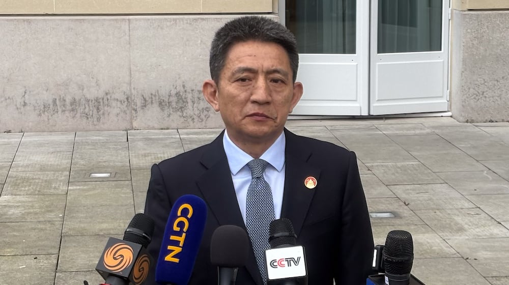 Chinese lead trade negotiator Li Chenggang gives a press conference at the Organization for Economic Cooperation and Development headquarters, Monday, March 16, 2026, in Paris, France. (AP Photo/Oleg Cetinic)