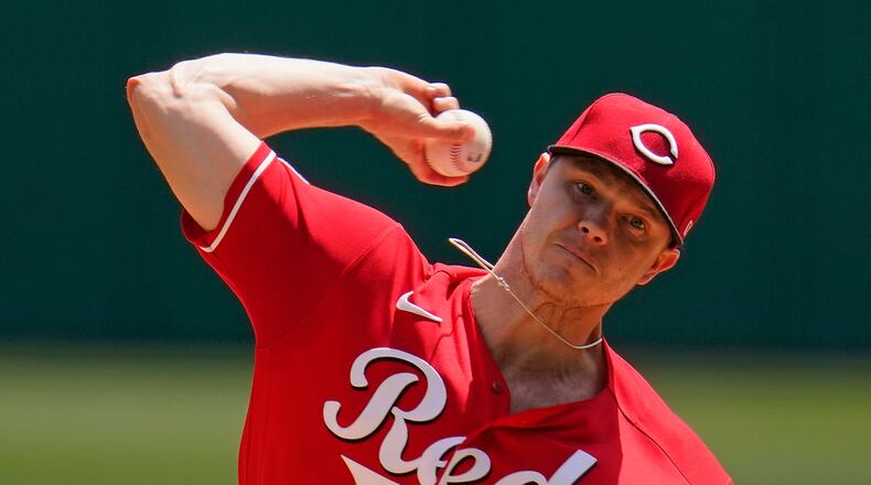 Cincinnati Reds starting pitcher Sonny Gray delivers during the first inning of a baseball game against the Pittsburgh Pirates in Pittsburgh, Wednesday, May 12, 2021.(AP Photo/Gene J. Puskar)