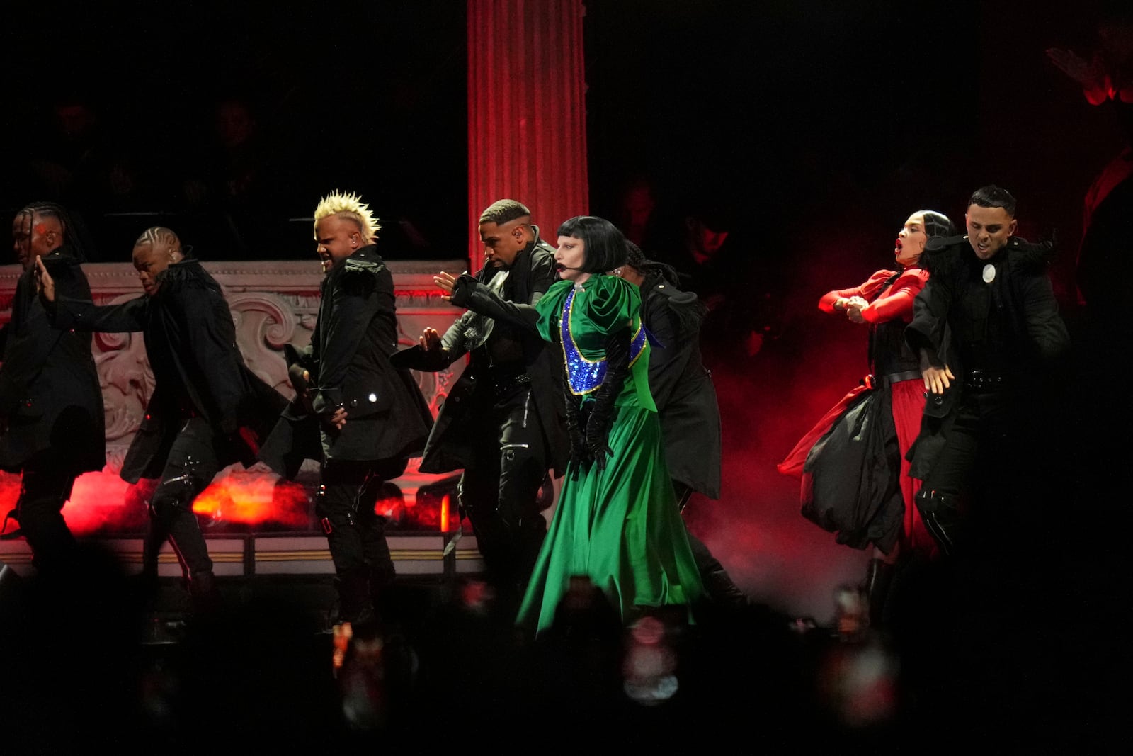 Lady Gaga, center, performs during her free concert on Copacabana Beach in Rio de Janeiro, Saturday, May 3, 2025. (AP Photo/Silvia Izquierdo)