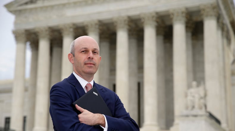 FILE - Tom Goldstein, who writes SCOTUSblog.com, poses for a photograph in front of the Supreme Court, Oct. 31, 2013, in Washington. (AP Photo/Alex Brandon, file)