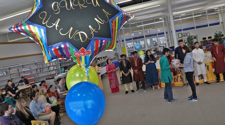 The Hindu Community of Springfield honored Springfield High School teachers with a “Guru Vandana” program Tuesday in the school’s library. The 20 teachers and three councelors were selected by Hindu students at Springfield to show their appreciation for the job they do. Teachers are revered in Hindu culture for imparting knowledge and guidance. BILL LACKEY/STAFF