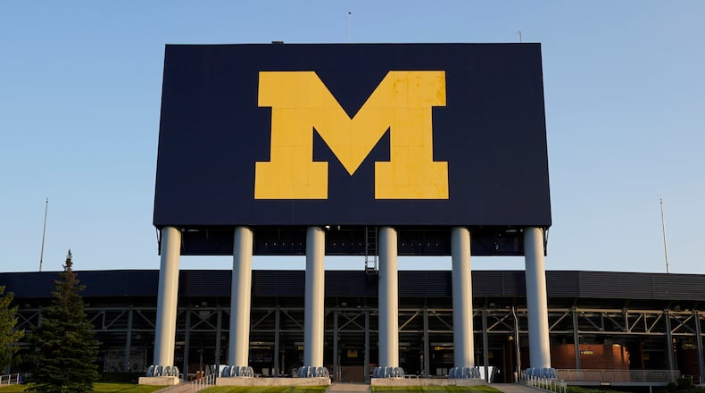FILE - The University of Michigan football stadium is seen, in Ann Arbor, Mich., Aug. 13, 2020. (AP Photo/Paul Sancya, File)