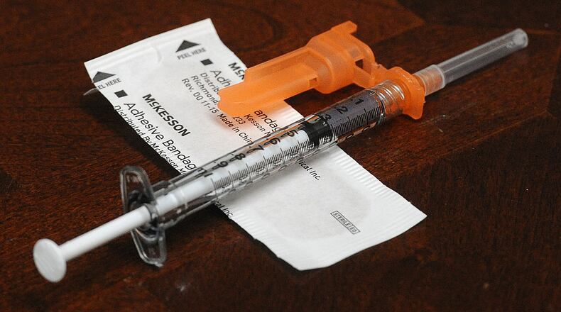 A new study shows natural immunity to COVID-19 provides similar protection to the virus as vaccinations, but doctors continue to recommend vaccinations to avoid severe outcomes from the virus. MARSHALL GORBY\STAFF