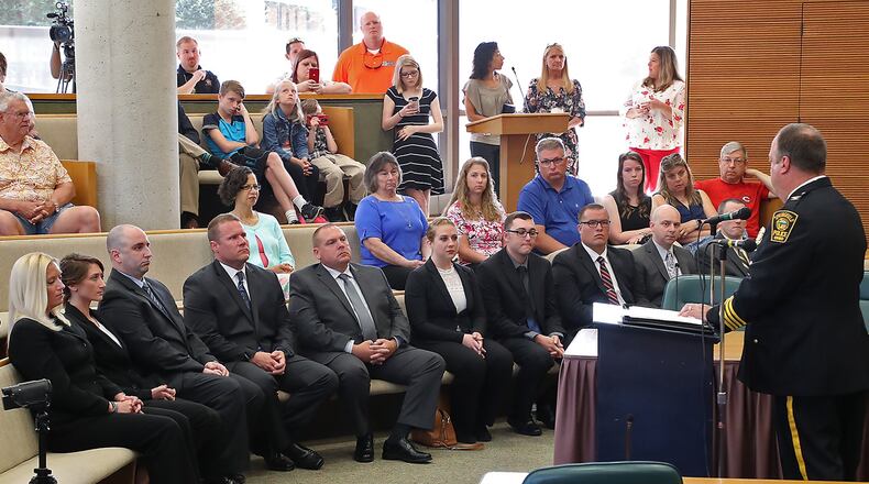 Springfield Police Chief Lee Graf addresses the city’s newest 11 officers, seated in the front row, that were sworn in Monday at the City Hall Forum. Bill Lackey/Staff