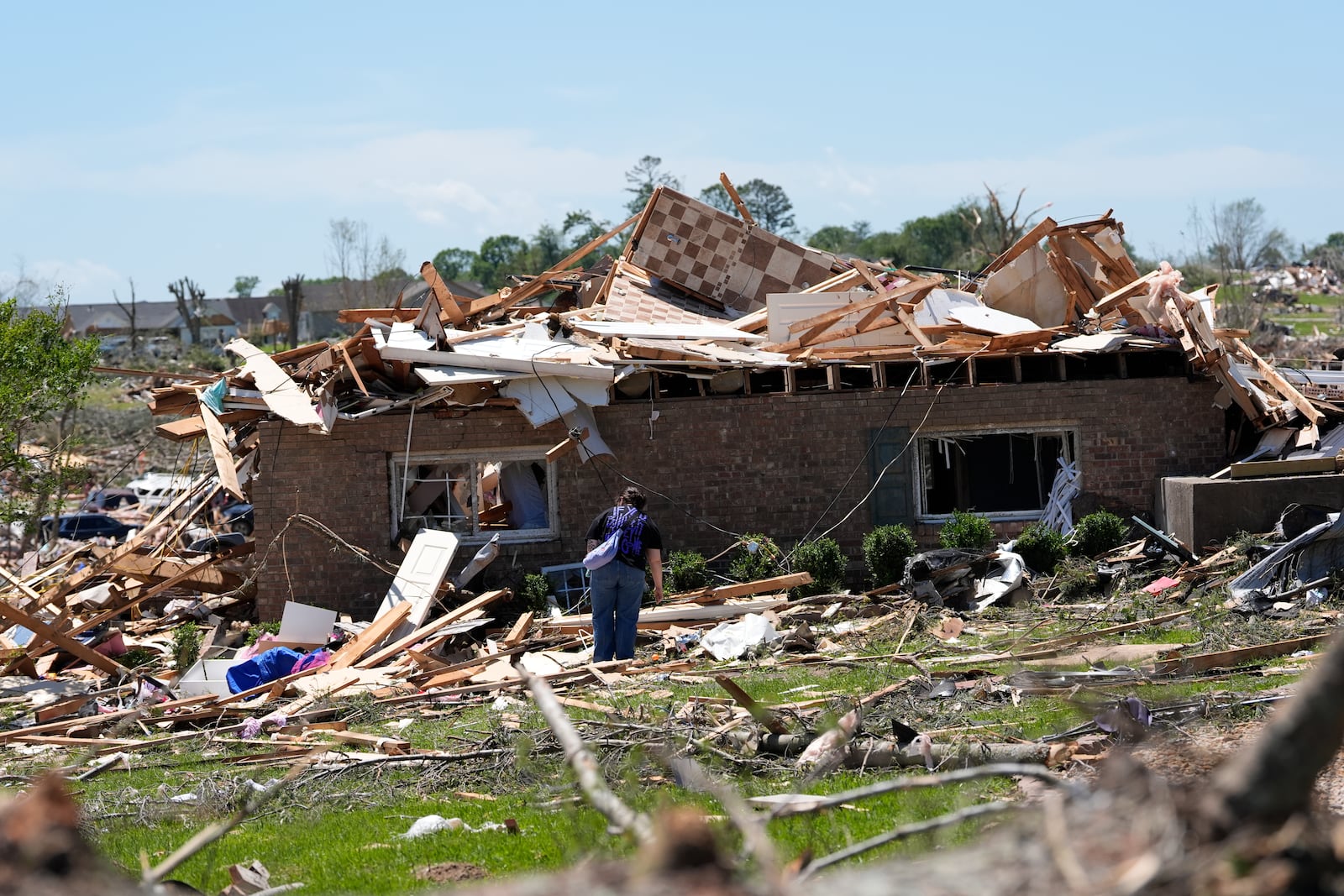 A home is destroyed after a severe storm passed the area on Saturday, May 17, 2025 in London, Ky. (AP Photo/Carolyn Kaster)