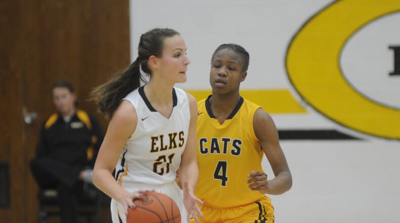 Centerville’s Emma Stanley (with ball) and Springfield’s Caralyssa Byrd square off in a game last season. MARC PENDLETON / STAFF