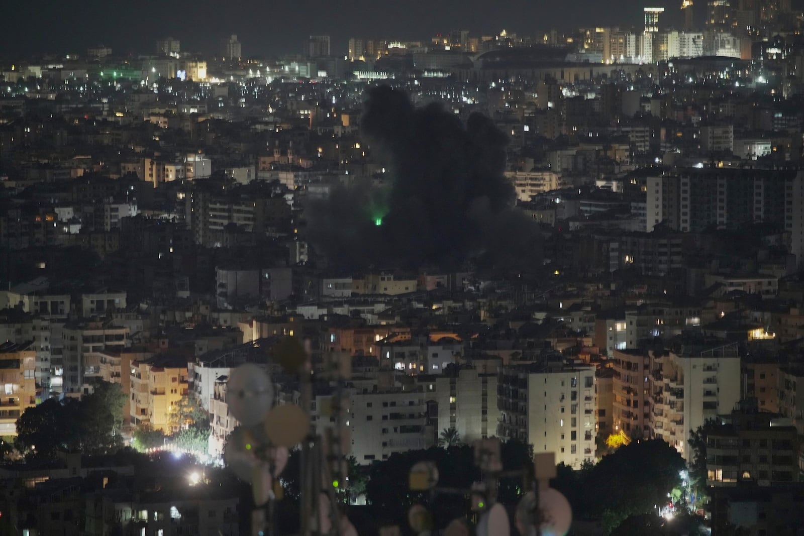 Smoke rises following an Israeli airstrike on Dahiyeh in the southern suburb of Beirut, Lebanon, Thursday, June 5, 2025. (AP Photo/Hassan Ammar)