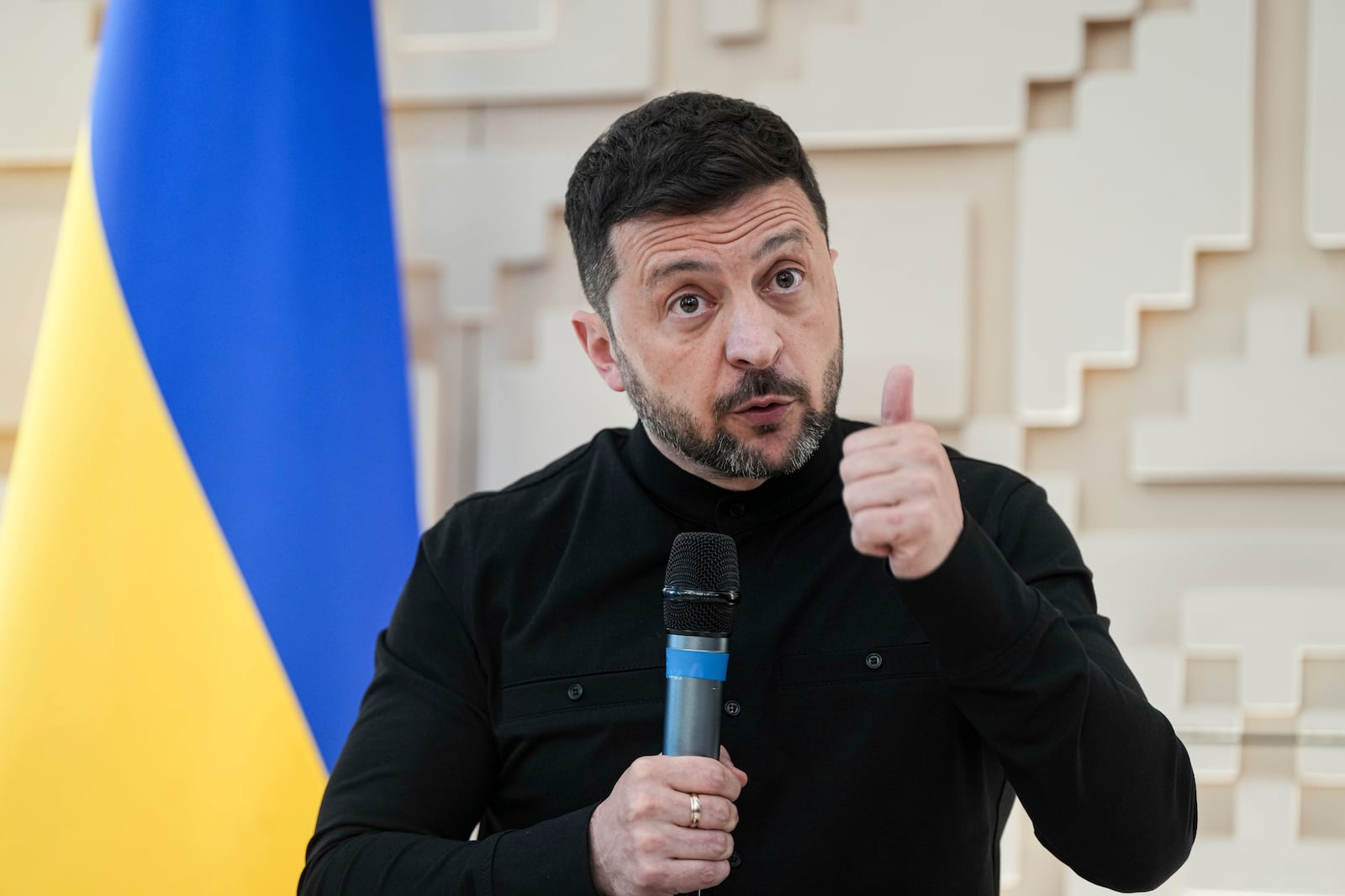 Ukrainian President Volodymyr Zelenskyy talks to journalists at the Ukrainian Embassy in Ankara, Turkey, Thursday, May 15, 2025. (AP Photo/Evgeniy Maloletka)