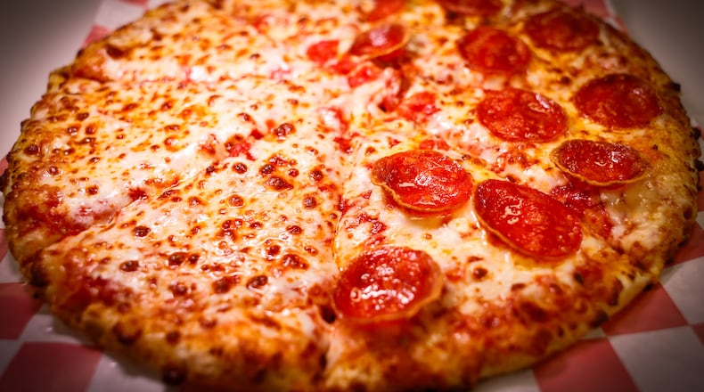 According to Premio Foods Inc., one in seven Americans will order takeout on Super Bowl Sunday and 60% of those orders will be pizza. NICK GRAHAM / STAFF
