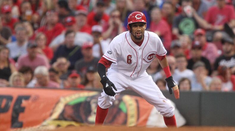 The Reds’ Billy Hamilton leads off base on Monday against the Marlins. David Jablonski/Staff