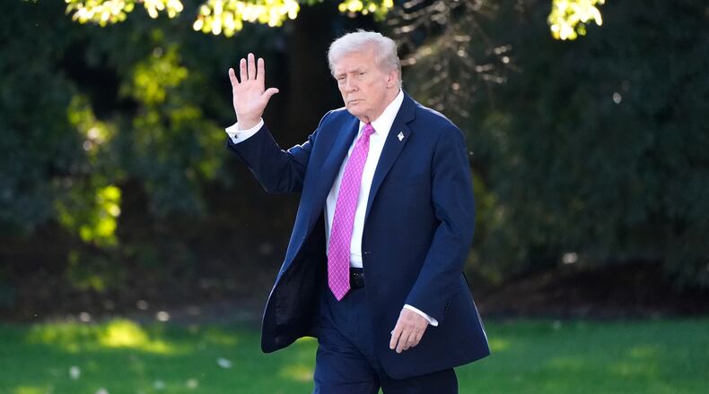 President Donald Trump waves as he walks to board Marine One before departing from the South Lawn of the White House, Friday, Oct. 17, 2025, in Washington. (AP Photo/Alex Brandon)