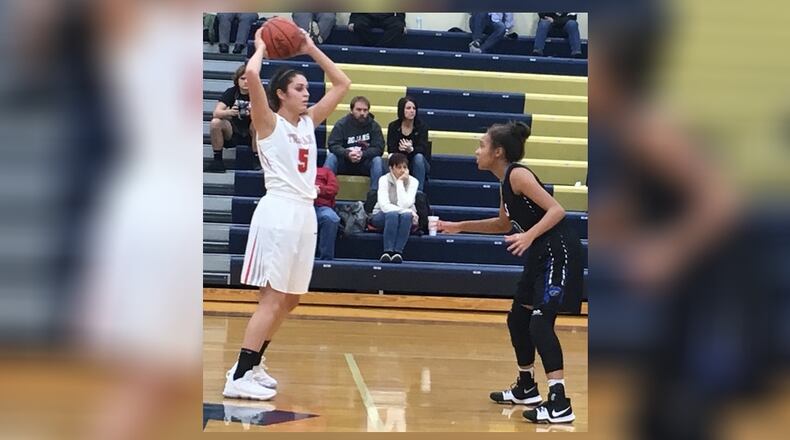 Senior Leslie Flores (5), shown during a tournament game last season vs. Cincinnati Christian, will lead a young Southeastern team next season. RICK CASSANO/STAFF