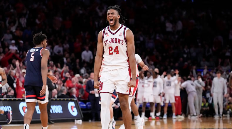 St. John's forward Zuby Ejiofor (24) reacts during the second half of an NCAA college basketball game against UConn in the championship of the Big East tournament, Saturday, March 14, 2026, in New York. (AP Photo/Yuki Iwamura)