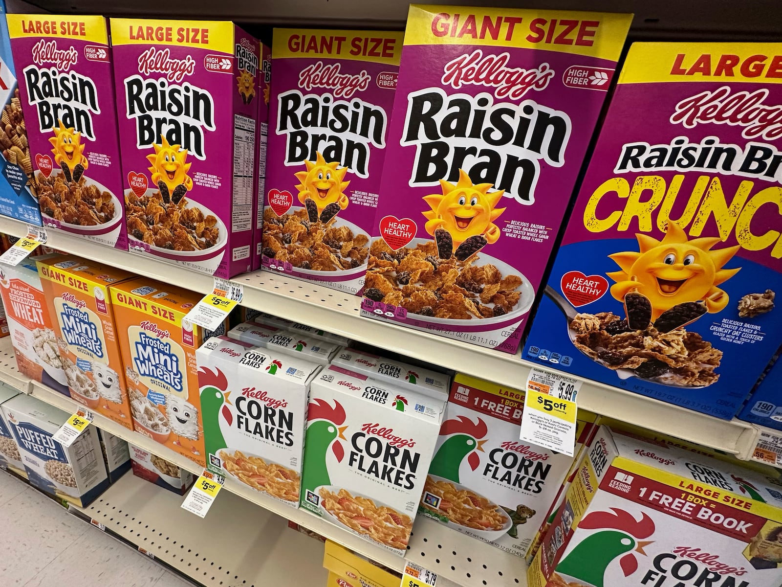 Boxes of Kellogg's breakfast cereal are seen at a super market, Friday, July 11, 2025, in Springfield, Pa. (AP Photo/Matt Slocum)