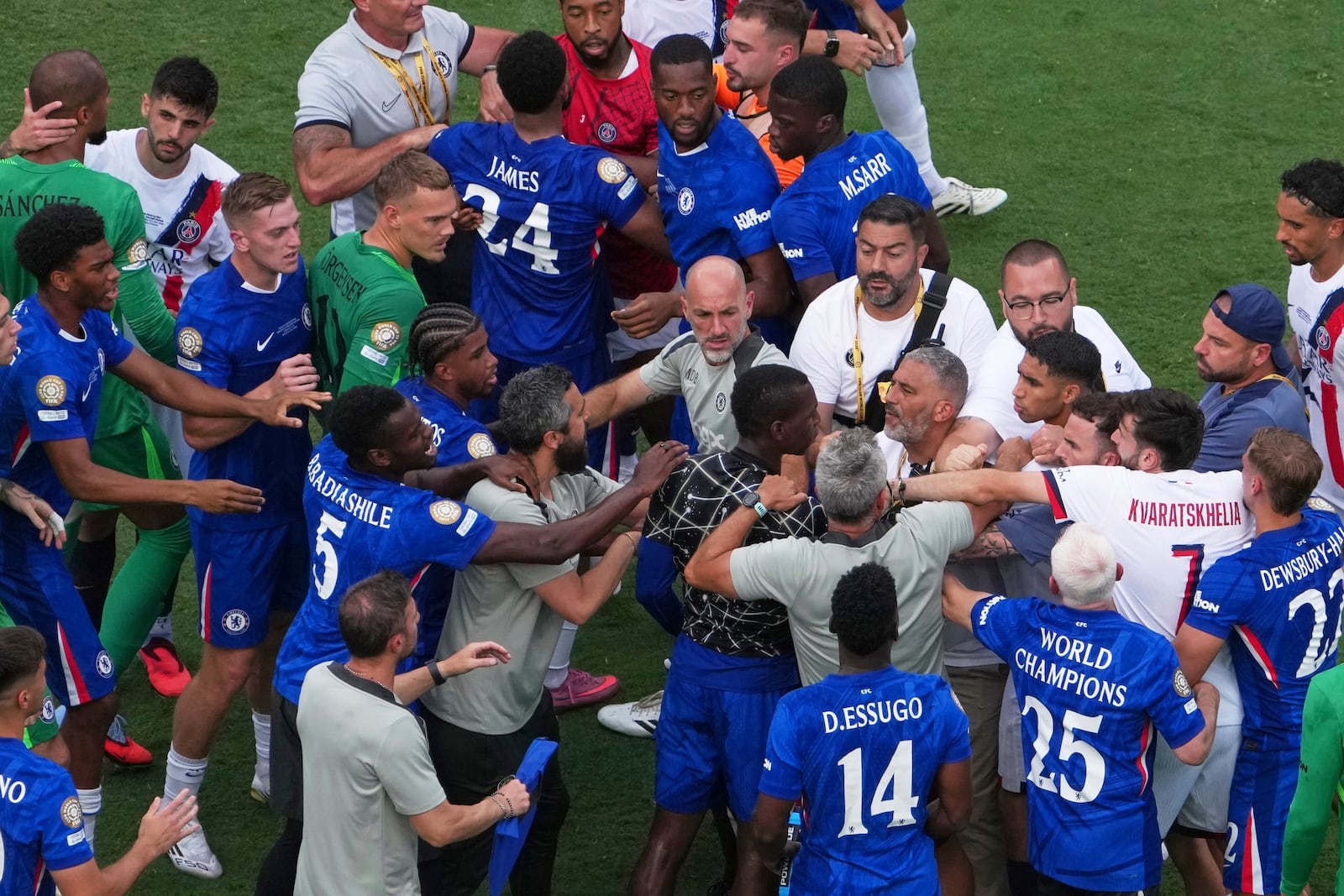 Paris Saint-Germain and Chelsea players scuffle after the Club World Cup final soccer match between Chelsea and PSG in East Rutherford, N.J., Sunday, July 13, 2025. (AP Photo/Matt Slocum)