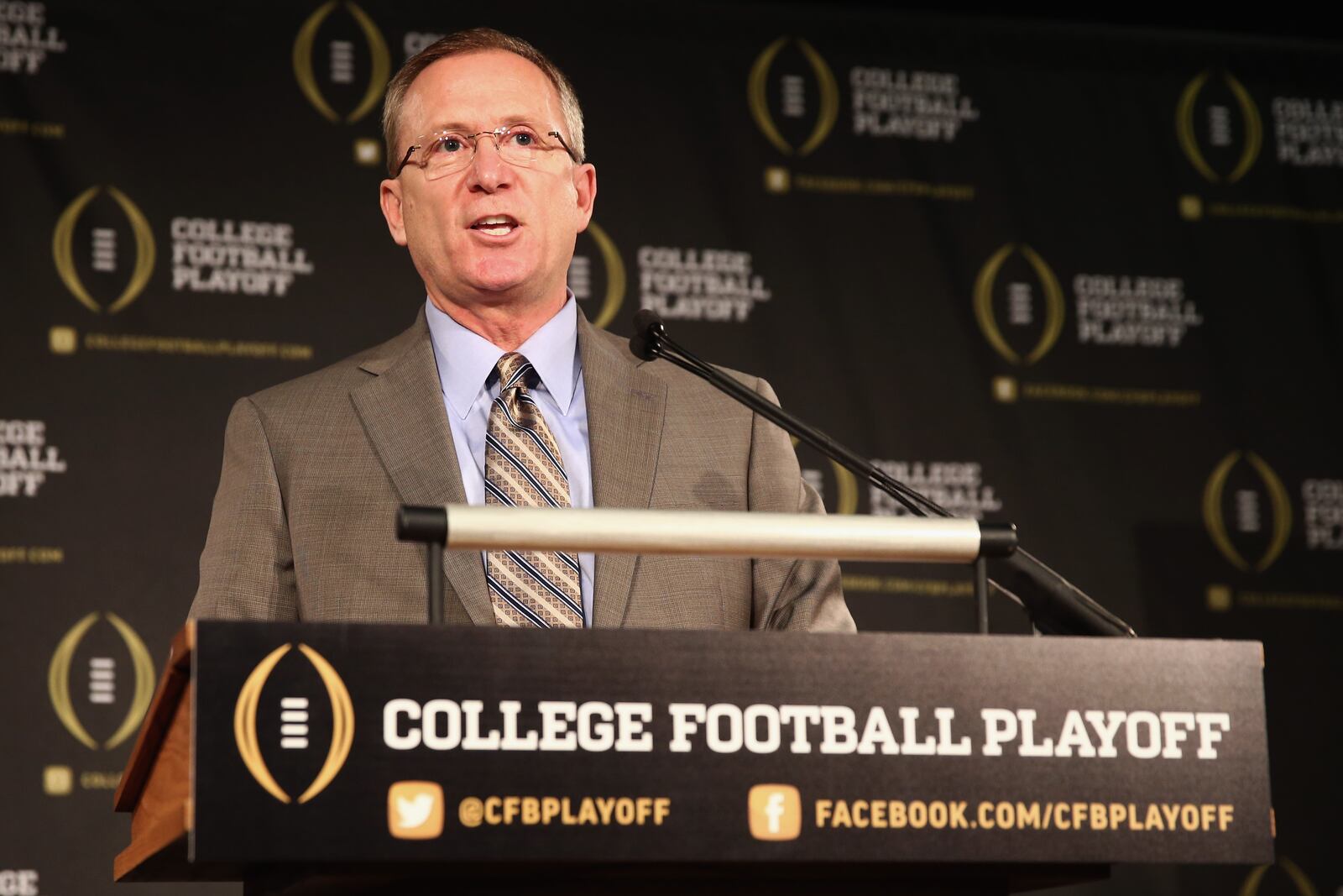 IRVING, TX - OCTOBER 16:  Jeff Long answers questions from the media after being named the chairman of the College Football Playoff selection committee on October 16, 2013 in Irving, Texas. Condoleezza Rice, Stanford University professor and former United States Secretary of State, was also chosen to serve as one of the 13 members that will select four teams to compete in the first playoff at the end of the 2014 season.  (Photo by Tom Pennington/Getty Images)