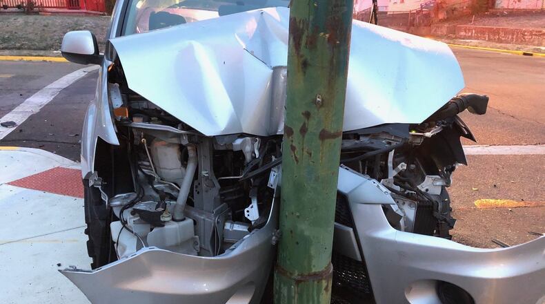 A two-vehicle crash at West Pleasant Street and Montgomery Avenue sent a silver Mitsubishi SUV into a utility pole.