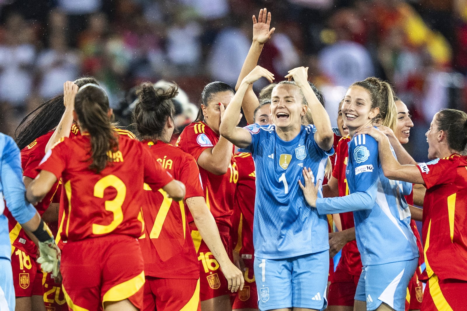 Spain players reacts after the Women's Euro 2025 semifinal soccer match between Germany and Spain at the Letzigrund stadium in Zurich, Switzerland, Wednesday, July 23, 2025. (Til Buergy/Keystone via AP)