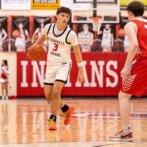 The Cedarville High School boys basketball team beat Southeastern 67-59 on Friday, Feb. 6, 2026 to win their third straight Ohio Heritage Conference South Division championship. MICHAEL COOPER / CONTRIBUTED PHOTO