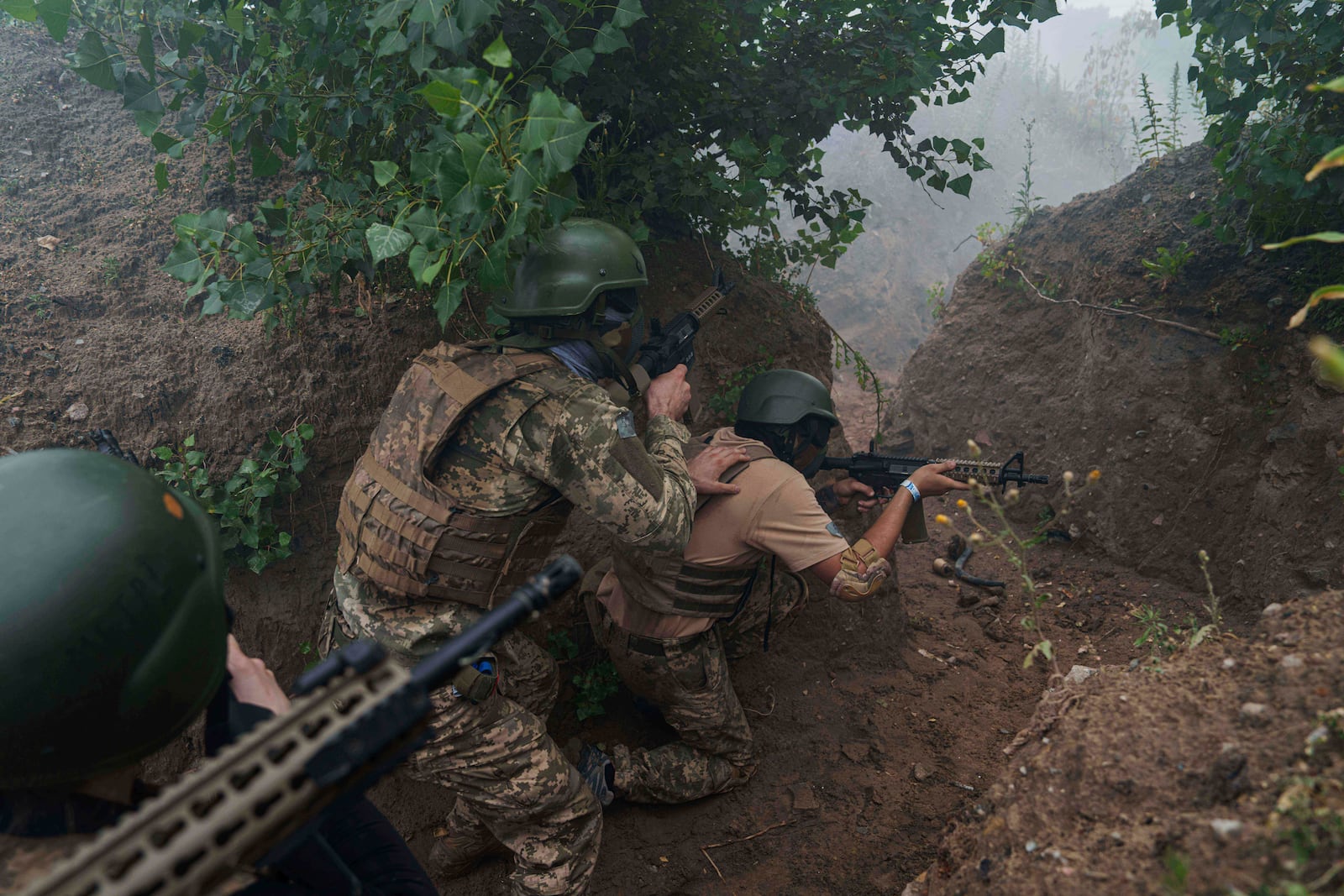 Ukrainian 3rd Assault Brigade recruits train at the polygon in Kyiv region, Ukraine, on Wednesday, July 16, 2025. (AP Photo/Evgeniy Maloletka)