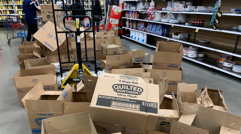 Panicked buyers wiped out toilet paper and paper towel stock on shelves of common products as the coronavirus spread across the country. WAYNE BAKER/STAFF