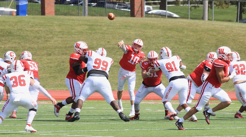 Wittenberg's Collin Brown throws a touchdown pass to Jake Saus, who runs 75 yards, in the first quarter against Cortland on Saturday, Sept. 4, 2021, at Edwards-Maurer Field. David Jablonski/Staff