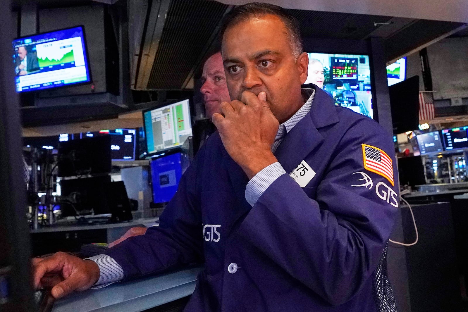 Specialist Dilip Patel works on the floor of the New York Stock Exchange, Tuesday, July 8, 2025. (AP Photo/Richard Drew)