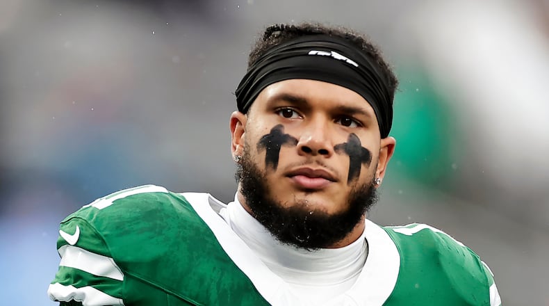 FILE - New York Jets linebacker Jermaine Johnson (11) warms up before an NFL football game against the Atlanta Falcons, Sunday, Nov. 30, 2025, in East Rutherford, N.J. (AP Photo/Adam Hunger, File)