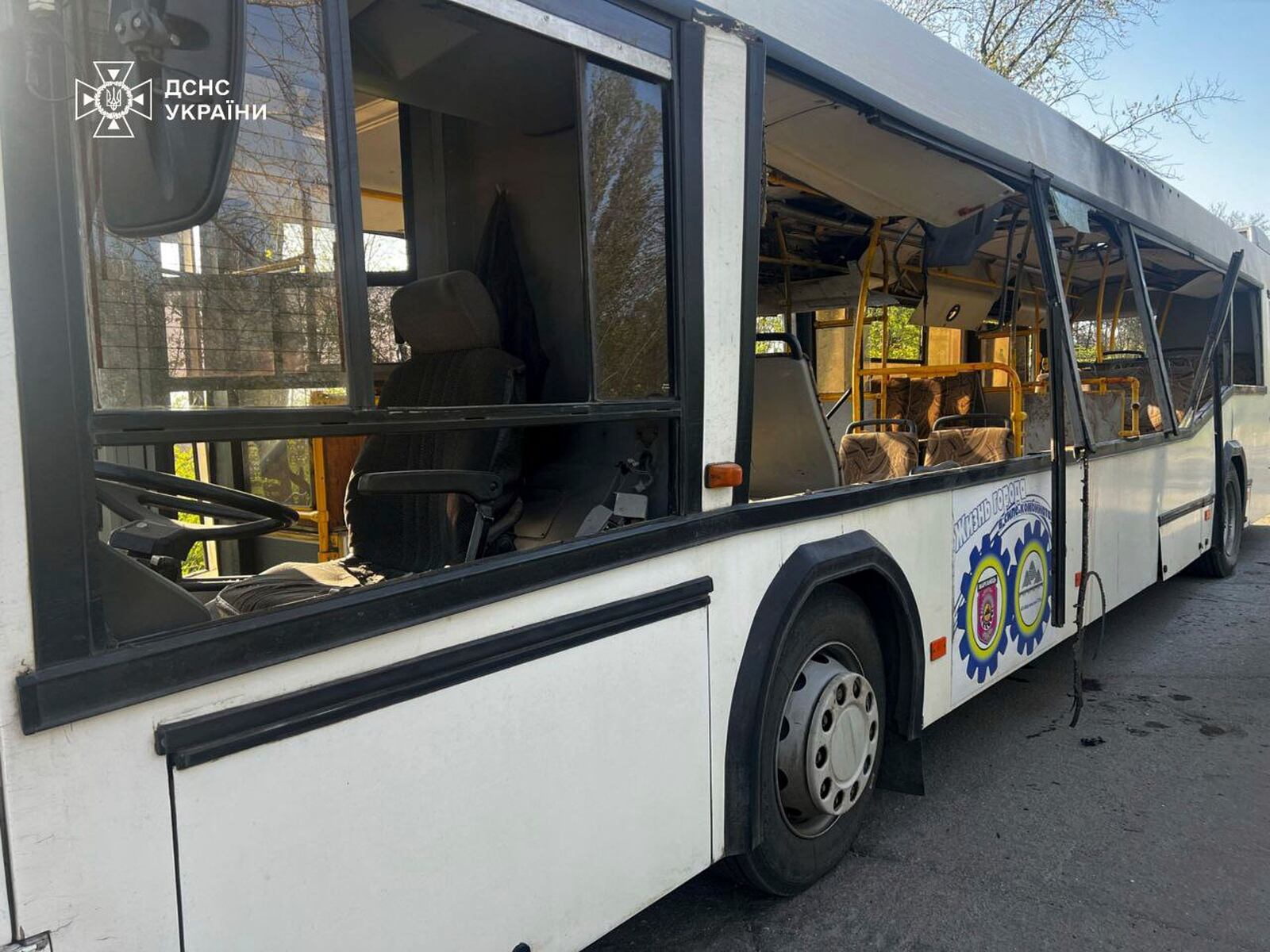 In this photo provided by the Ukrainian Emergency Service, a damaged bus that was hit by the Russian drone in Marhanets, Dnipropetrovsk region, Wednesday, April 23, 2025. (Ukrainian Emergency Service via AP)