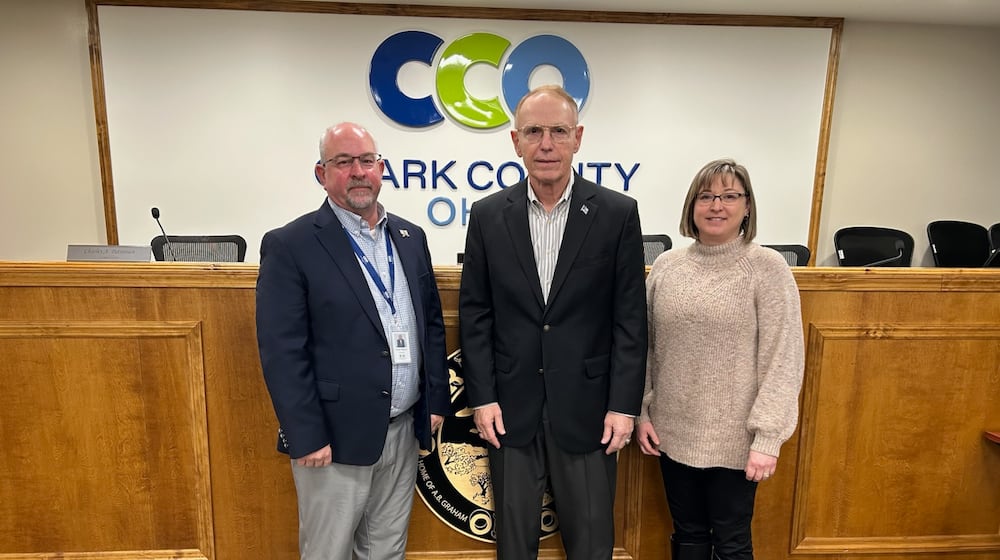 Clark County commissioners Charles Patterson (left) and President Sasha Rittenhouse (right) named Rick Lohnes (middle) as acting commissioner until the Republican Central Committee appoints someone to take the seat until there is an election. Brooke Spurlock/Staff