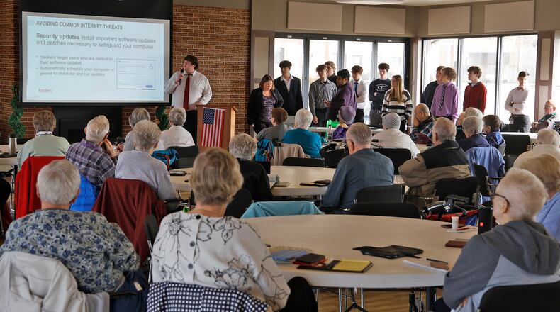 Residents of the Springfield Masonic Community listen to a program about technology and internet threats, put on by the Cyber Security students from the Springfield/Clark CTC Friday, Feb. 23, 2024. BILL LACKEY/STAFF