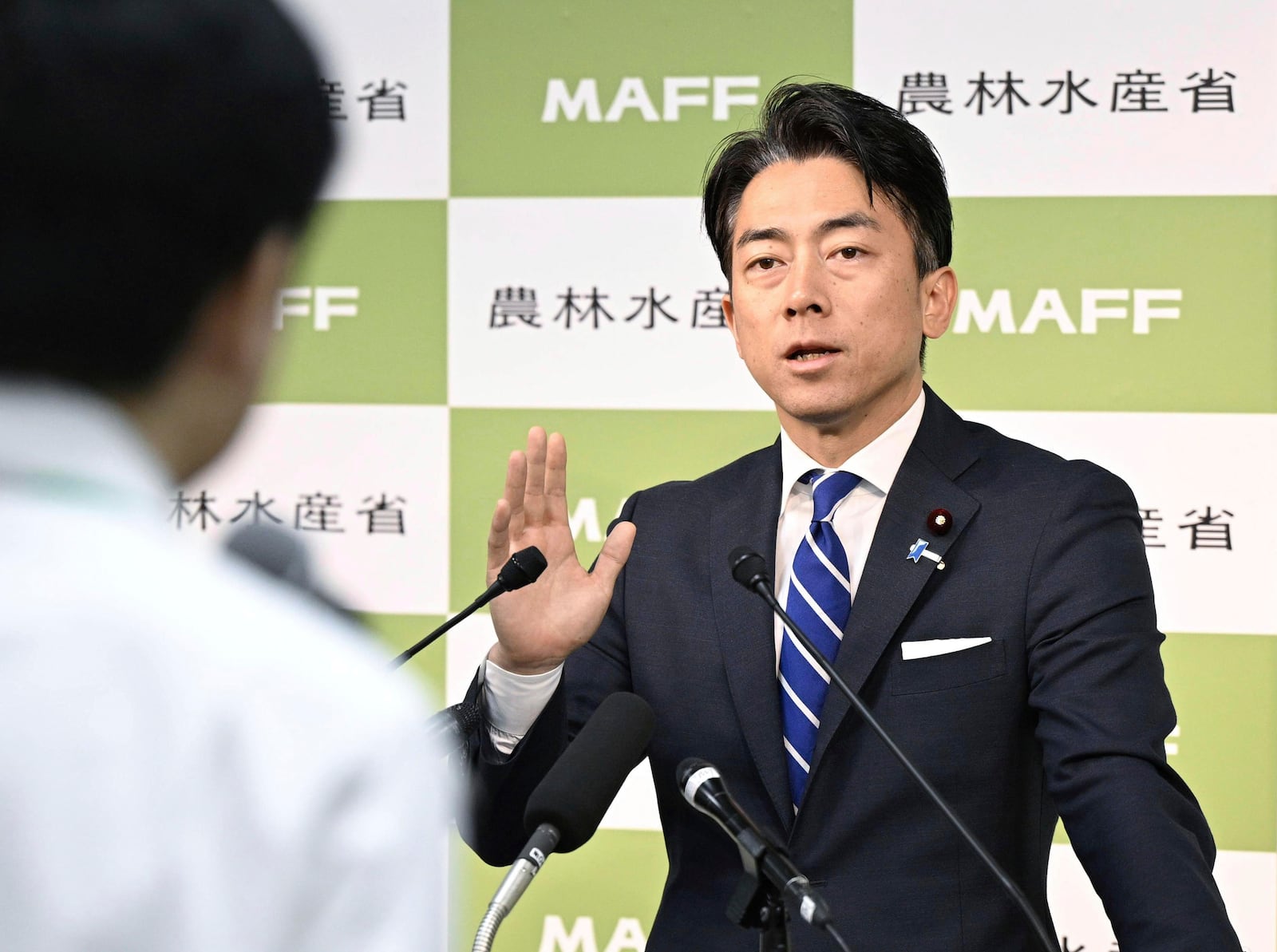 Japan's Agriculture Minister Shinjiro Koizumi attends a press conference at the ministry in Tokyo Friday, May 30, 2025. (Kyodo News via AP)