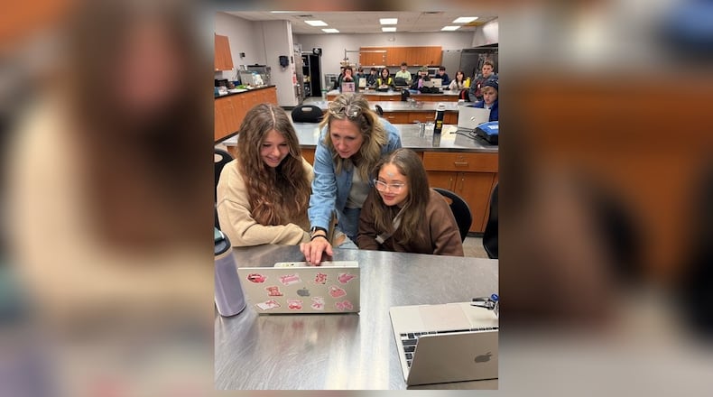 Global Impact STEM Academy teacher Andrea Keener teachers her students during class. CONTRIBUTED