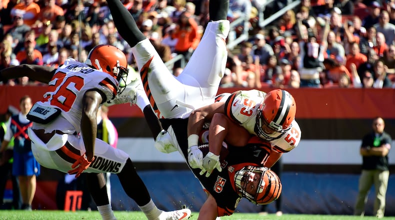 ›CLEVELAND, OH - OCTOBER 01: Tyler Kroft #81 of the Cincinnati Bengals makes a touch down catch and is taken down by Joe Schobert #53 of the Cleveland Browns in the second half at FirstEnergy Stadium on October 1, 2017 in Cleveland, Ohio. (Photo by Jason Miller /Getty Images)