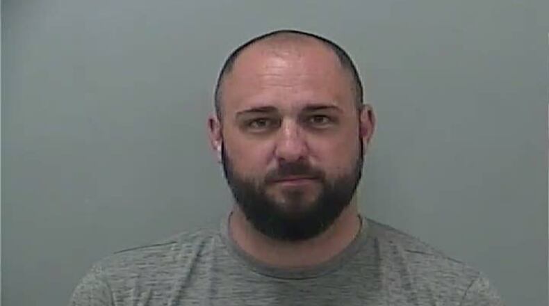 Mug shot from Delaware County jail records.