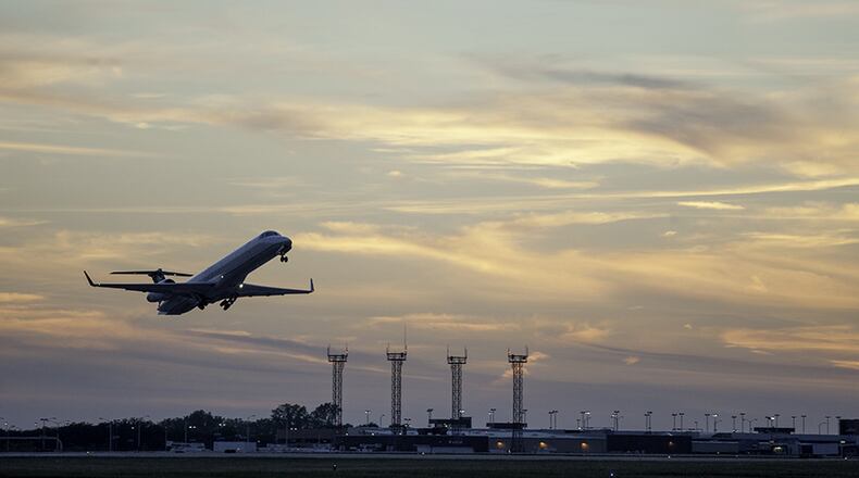 An airplane takes off at the Dayton International Airport on Wednesday, Dec. 11, 2019.