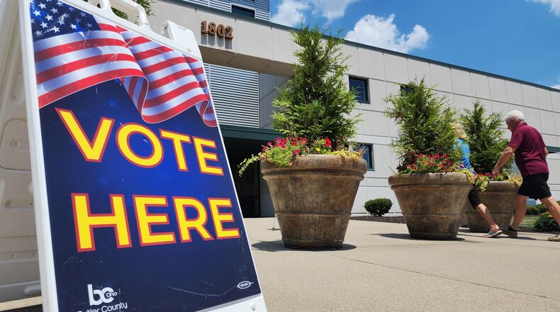 Voters line up to cast their ballots on the first day of early voting for thebIssueb1 special election Tuesday, July 11, 2023 at Butler County Board of Elections in Hamilton. NICK GRAHAM/STAFF