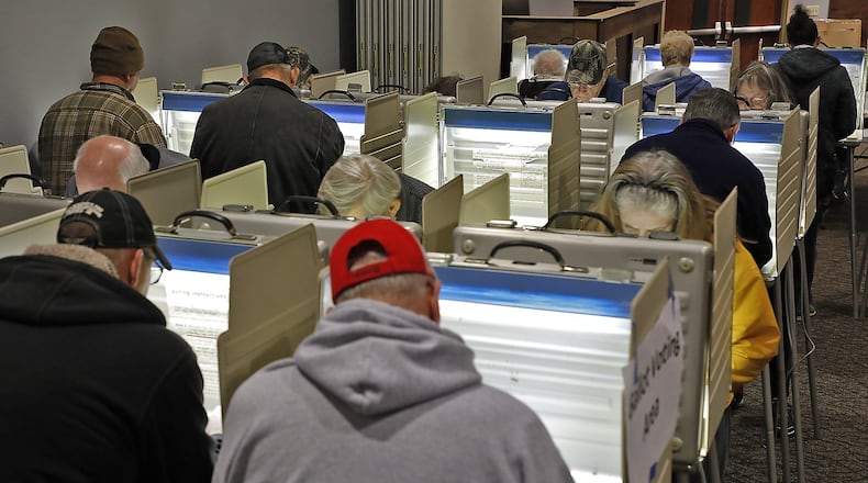 Every voting booth was full at the First Christian Church on Middle Urbana Road Tuesday. Bill Lackey/Staff
