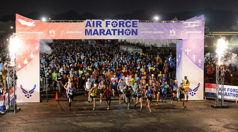 Runners take off at the start of the 2019 Air Force Marathon on Wright-Patterson Air Force Base. . U.S. AIR FORCE PHOTO/WESLEY FARNSWORTH