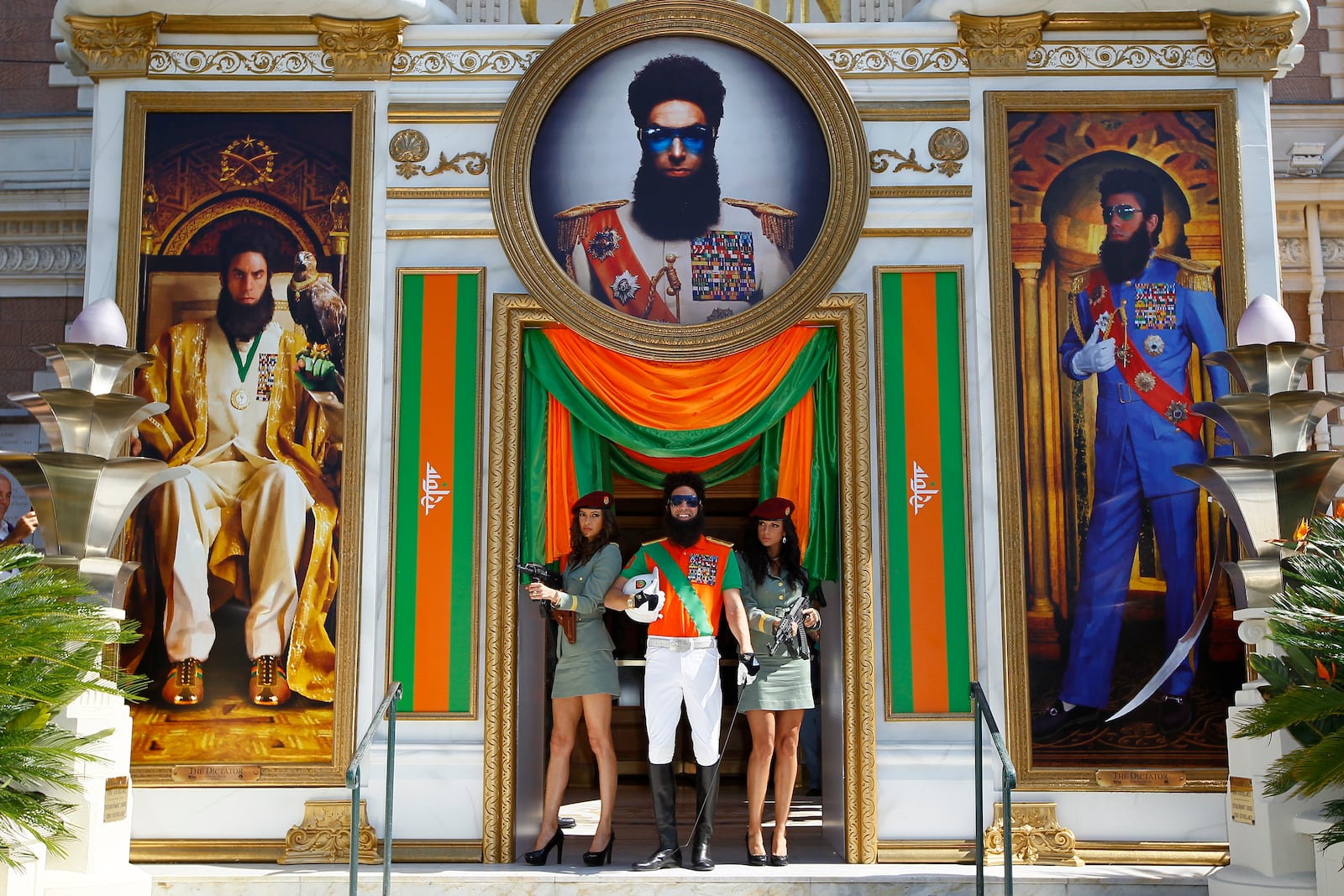FILE - Actor Sacha Baron Cohen, center, poses as he arrives for a photo call for The Dictator at the 65th international film festival, in Cannes, southern France, Wednesday, May 16, 2012. (AP Photo/Francois Mori, File)