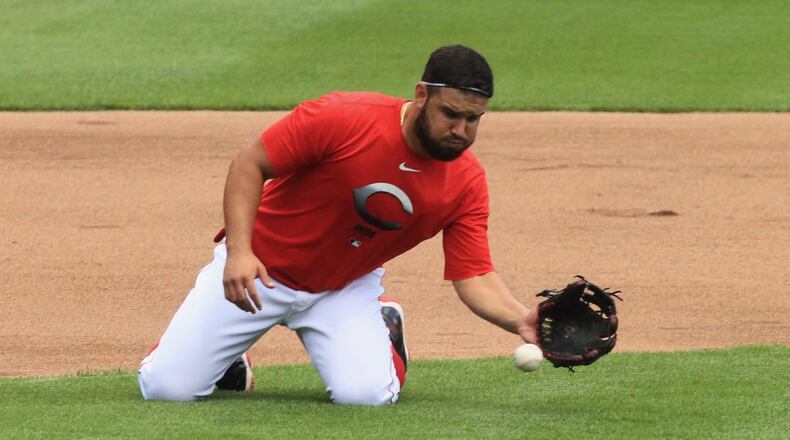 Eugenio Suarez works out on the first day of Summer Camp on Friday, July 3, 2020, at Great American Ball Park in Cincinnati. David Jablonski/Staff