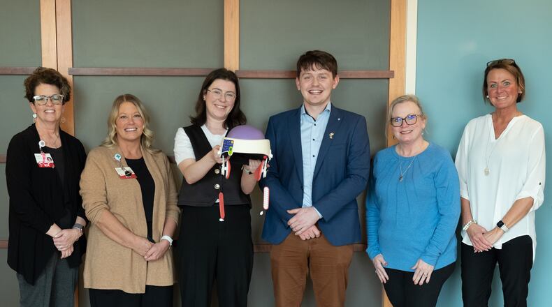 Mercy Health in Springfield and Urbana is participating in a clinical trial to reduce hair loss in breast cancer chemotherapy patients. (From left to right) Tracy Adrian, breast health navigator; Chaundra Foss-Blizard, clinical research nurse; Roisin Ni Hamaill, Luminate Medical senior clinical trials associate; Aaron Hannon, Luminate Medical co-founder and CEO; Lisa Gibson, Mercy Health director of oncology services; and Sarah Lowry, oncology nurse navigator. CONTRIBUTED